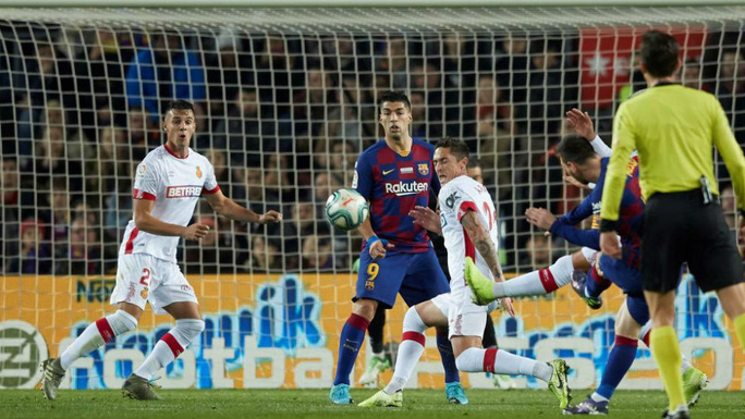 Messi-lap-hat-trick-barcelona-vui-dap-mallorca